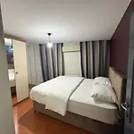 Taksim Camdali Suit